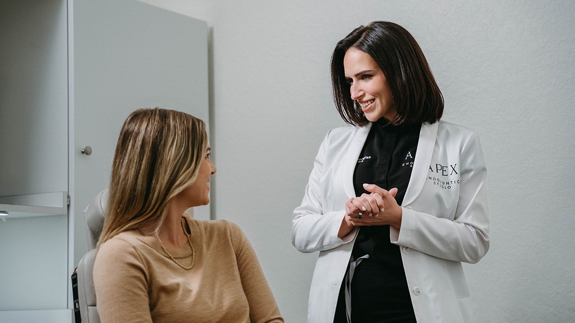 Dr and patient in chair